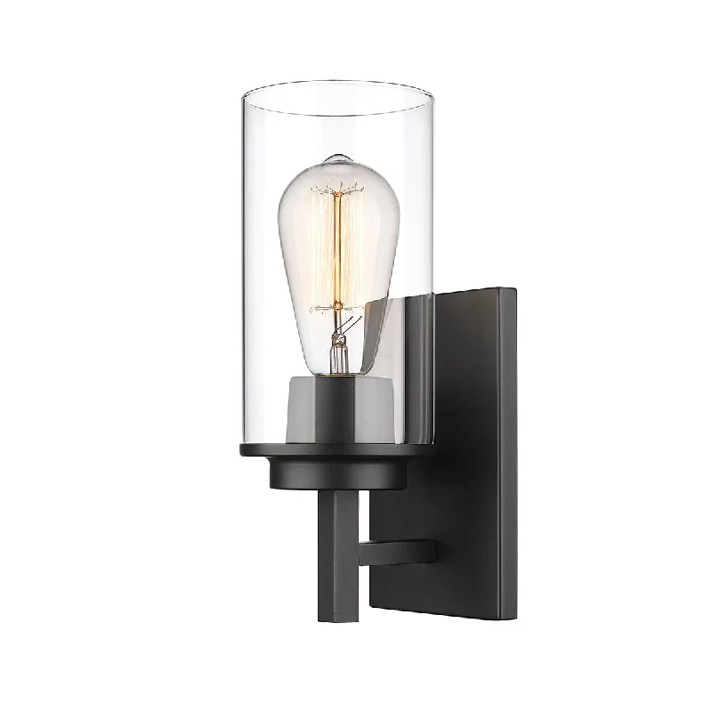 Industrial Lighting for Textile MillsJanna Wall Sconce - Matte Black - Clear Glass - 5in. Extension - E26 Medium Base Industrial Lighting for Textile MillsJanna Wall Sconce - Matte Black - Clear Glass - 5in. Extension - E26 Medium Base