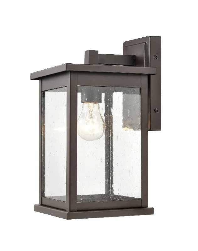 Industrial Lighting for Pharmaceutical ManufacturingBowton Outdoor Wall Sconce - Powder Coat Bronze - Clear Seeded Glass - 8.125in. Extension - E26 Medium Base Industrial Lighting for Pharmaceutical ManufacturingBowton Outdoor Wall Sconce - Powder Coat Bronze - Clear Seeded Glass - 8.125in. Extension - E26 Medium Base