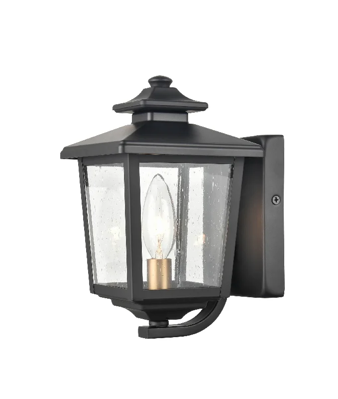 Industrial Task Lighting for Precision WorkstationsEldrick Outdoor Wall Sconce - Powder Coat Black - Clear Seeded Glass - 6.375in. Extension - E12 Candelabra Base Industrial Task Lighting for Precision WorkstationsEldrick Outdoor Wall Sconce - Powder Coat Black - Clear Seeded Glass - 6.375in. Extension - E12 Candelabra Base