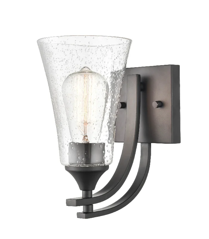 Industrial Lighting for Automotive Manufacturing PlantsNatalie Wall Sconce - Matte Black - Clear Seeded Glass - 8.25in. Extension - E26 Medium Base Industrial Lighting for Automotive Manufacturing PlantsNatalie Wall Sconce - Matte Black - Clear Seeded Glass - 8.25in. Extension - E26 Medium Base
