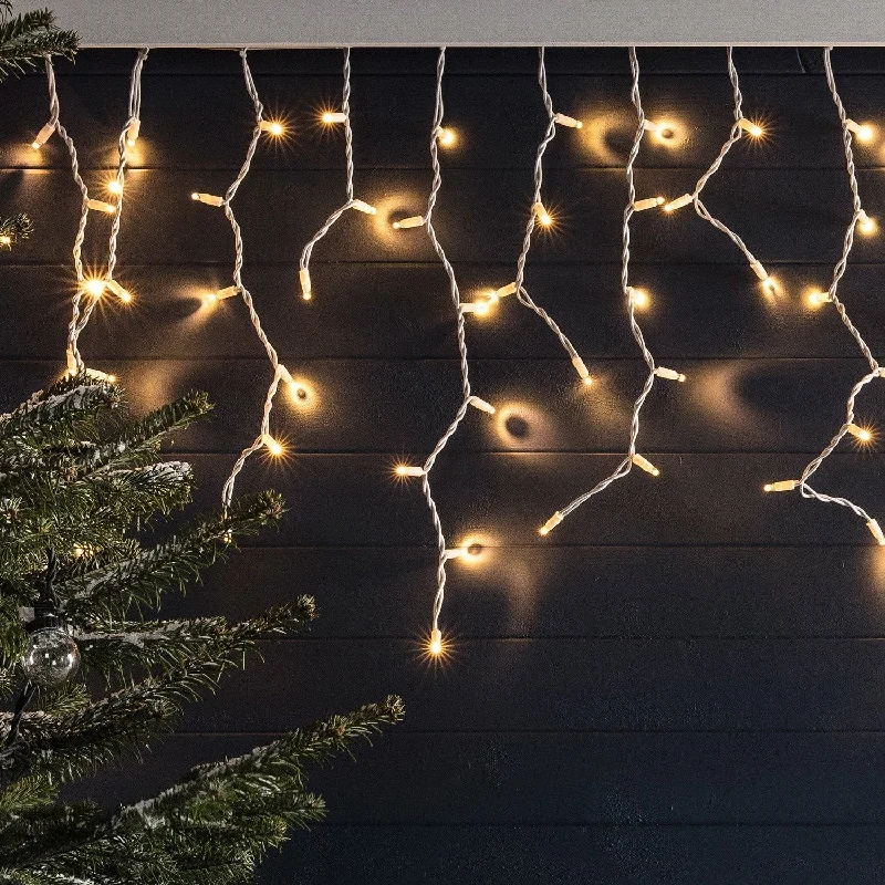 LED String Lights with Warm White GlowPro Connect 18m 900 Traditional Warm White Connectable Icicle Lights White Cable