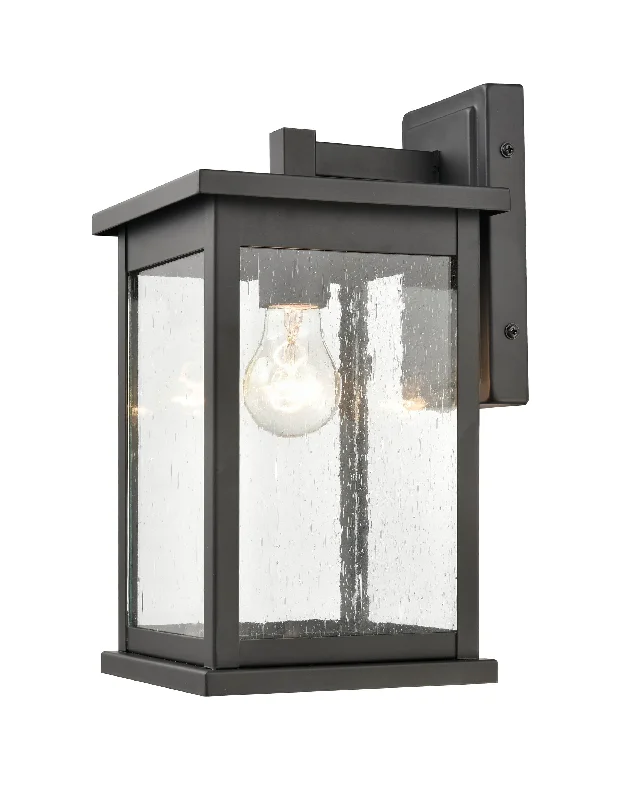 Industrial Flood Lighting for Outdoor Loading DocksBowton Outdoor Wall Sconce - Powder Coat Black - Clear Seeded Glass - 8.125in. Extension - E26 Medium Base Industrial Flood Lighting for Outdoor Loading DocksBowton Outdoor Wall Sconce - Powder Coat Black - Clear Seeded Glass - 8.125in. Extension - E26 Medium Base