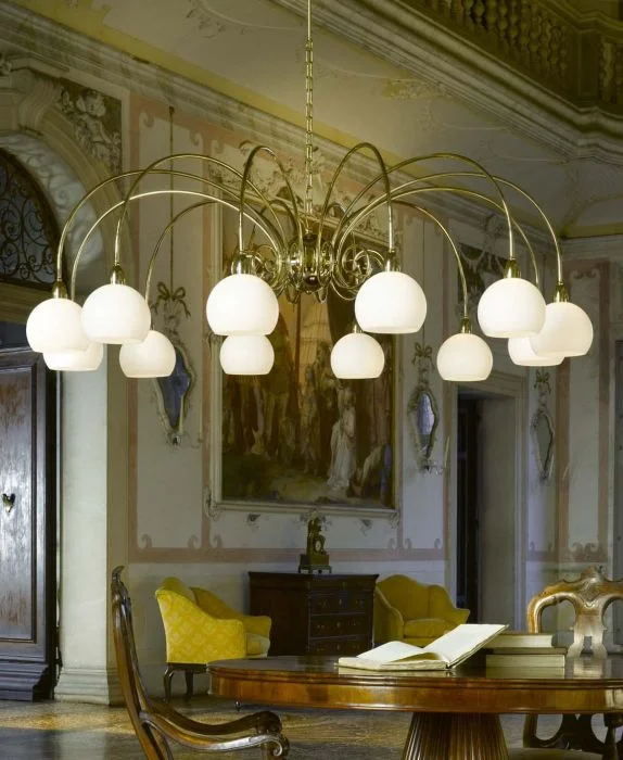 Oversized Chandeliers as a Statement Piece in Living RoomsGold-Plated Modern Chandelier With White Glass Dome Shades