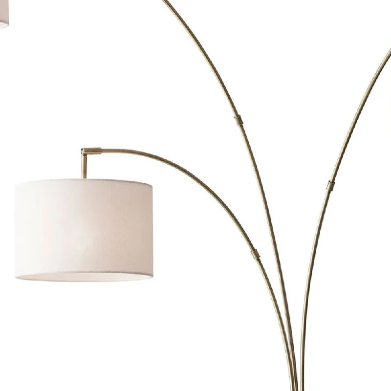 Bohemian Inspired Floor Lamp for Eclectic Home DecorThree Light Floor Lamp Brass Metal Arc Arms Bohemian Inspired Floor Lamp for Eclectic Home DecorThree Light Floor Lamp Brass Metal Arc Arms