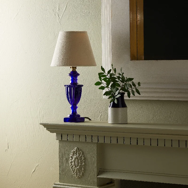 crystal table lamps with dazzling prisms for a glamorous effectUrnie bedside lamp in blue resin crystal table lamps with dazzling prisms for a glamorous effectUrnie bedside lamp in blue resin